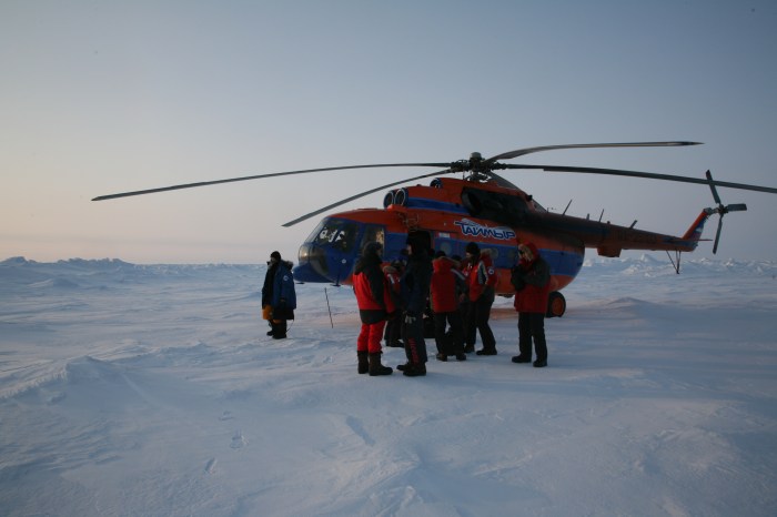 Helicopter and all of us at the North Pole